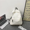 Muji black schoolbag for male college students, high school and junior high school students, simple solid color for male students, black backpack for female students Application Scenario